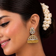 Gold-Plated CZ Diamond Jhumka Earrings with Emerald Accent – Traditional Bridal Jewelry