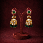increase the size of the earrings 20% proportionately throughout. do not change anything about the earrings. do not change the size, shape or design of the earrings at all