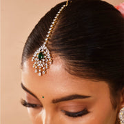 Elegant Diamond Look Maang Tikka with Emerald Centerpiece in Gold Polish