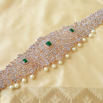Exquisite Diamond Look Emerald Bridal Vaddanam with Pearl Drops