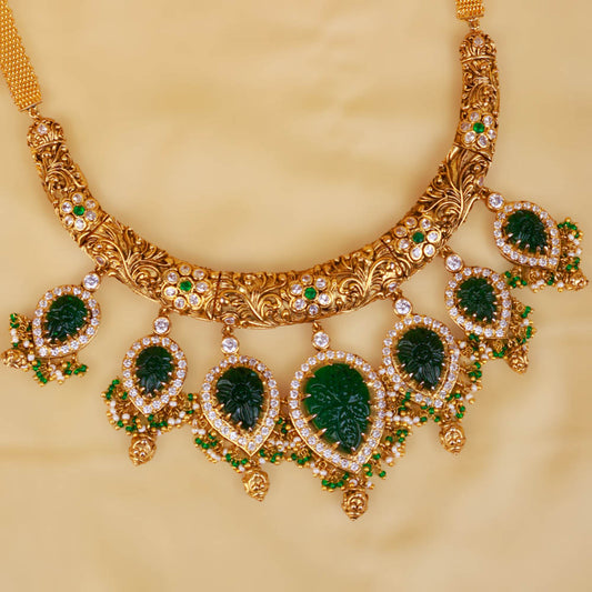 Gold Plated Hasli Choker Necklace with Carved Emeralds