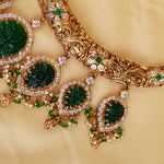 Gold Plated Hasli Choker Necklace with Carved Emeralds
