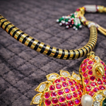 Golden Phoenix Pendant with Black & Gold Hasli Necklace Design
