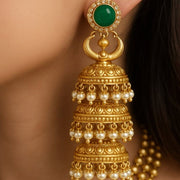 Regal Triple Dome Jhumkas with Pearls & Emerald Stud – Antique Gold Finish in Pure Silver