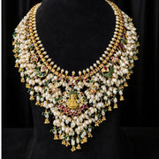Floral Guttapusalu Necklace with Delicate Rice Pearls
