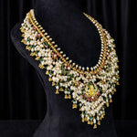 Floral Guttapusalu Necklace with Delicate Rice Pearls
