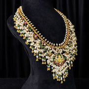 Floral Guttapusalu Necklace with Delicate Rice Pearls
