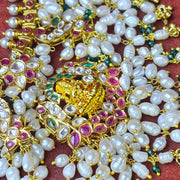 Floral Guttapusalu Necklace with Delicate Rice Pearls
