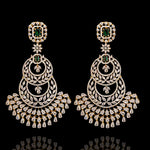 A pair of Chandbali style long earrings with 18K gold polish and sparkling cubic zirconia stones.