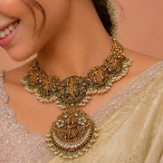 Antique Dasavatharam Necklace with Kundan and Pearl Detailing
